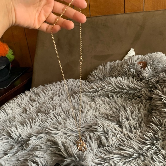 NWOT Harry Potter Time Turner Swiveling Hourglass Rotating Time Necklace - Picture 3 of 7